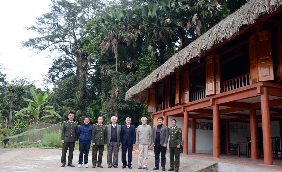 A group of people standing in front of a buildingAI-generated content may be incorrect.