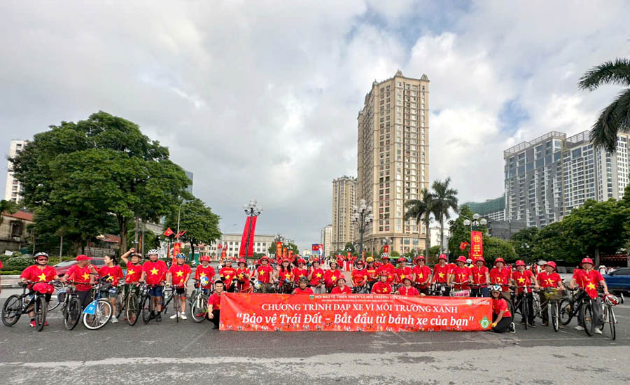 A group of people in red shirtsAI-generated content may be incorrect.