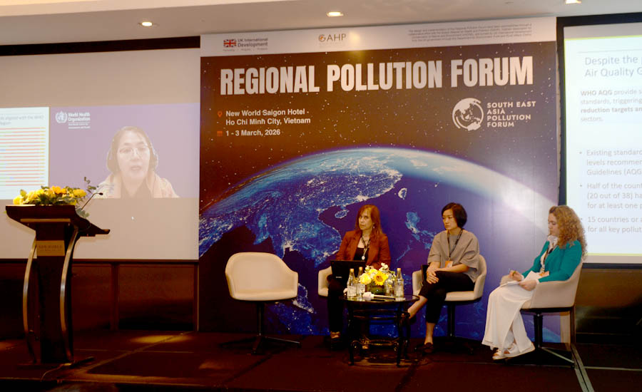 A group of people sitting on a stageAI-generated content may be incorrect.